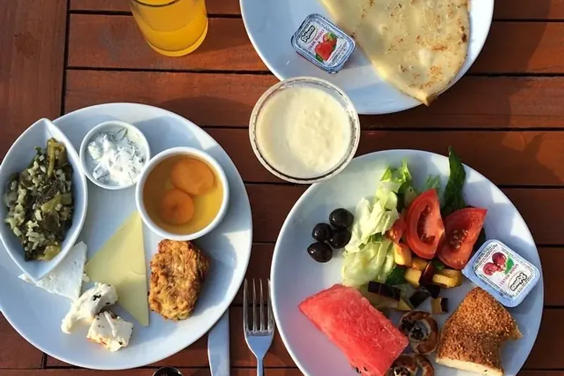 A Turkish breakfast laid out on the rooftop terrace