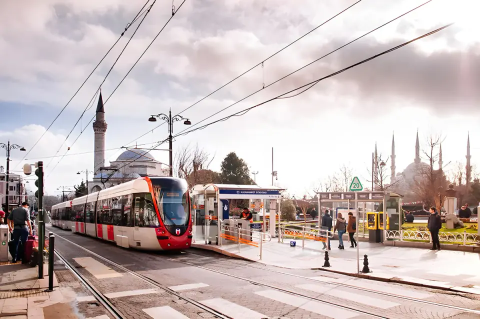 The T1 tram arriving at the Sultanahmet stop, mosques behind